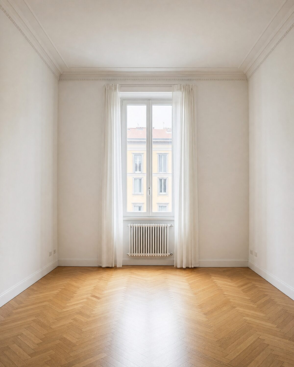 Empty living room in Milan, front view